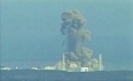 Smoke rises from Fukushima Daiichi nuclear power complex in this still image from video footage